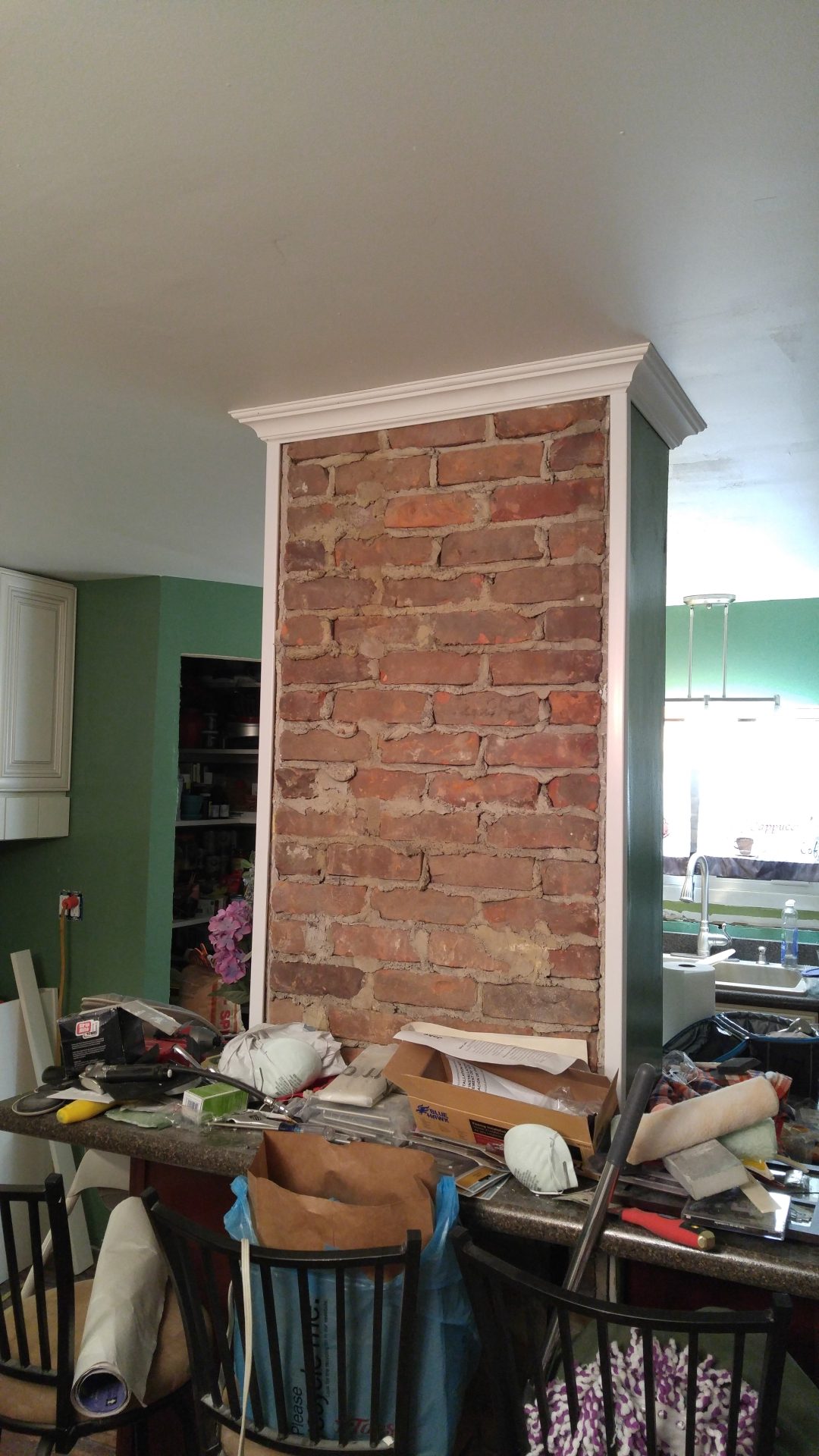 Original 1930s walls uncovered in kitchen-- bead board and 24 studs!